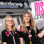 Two apprentices from Superdrug's Rise Up To Level Up campaign stand outside a store